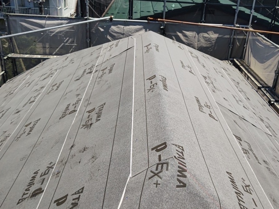 防水シート張り上げ